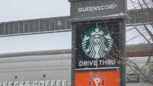 Starbucks tests robotic and AI systems at select stores to improve order processing and inventory tasks amid a bid to revive sales.