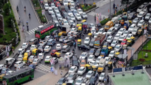 Heavy traffic movement and public transport systems in an Indian metro city amid growing focus on urban mobility reforms.
