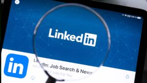 LinkedIn has introduced a new reporting option for AI-generated posts while replacing its AI writing tool with a proofreading feature aimed at encouraging authentic professional conversations.